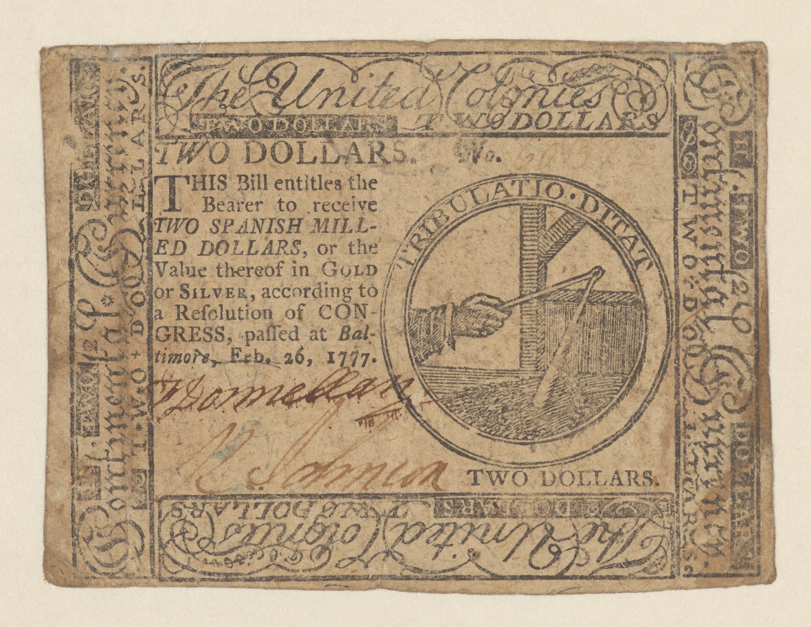 Continental Currency two-dollar note dated February 26, 1777, with the TRIBULATIO DITAT emblem of a hand and flail over wheat