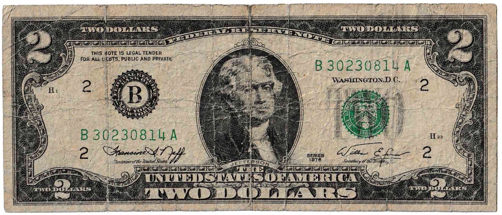 A heavily worn and yellowed Series 1976 two-dollar bill, face