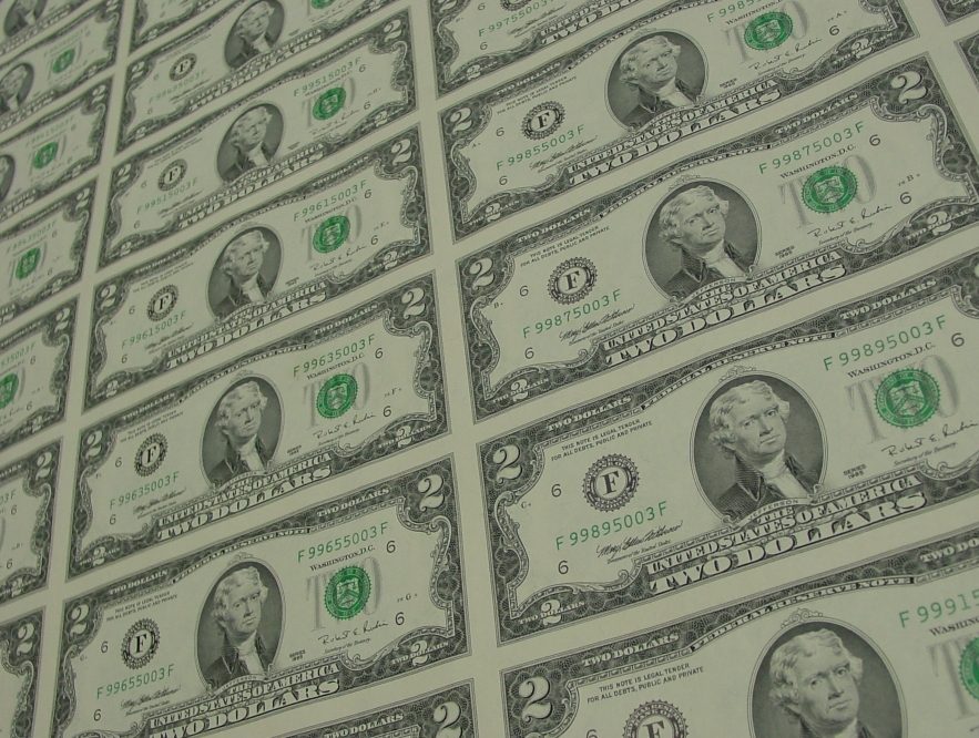 An uncut 32-subject sheet of $2 Federal Reserve Notes, four across and eight down